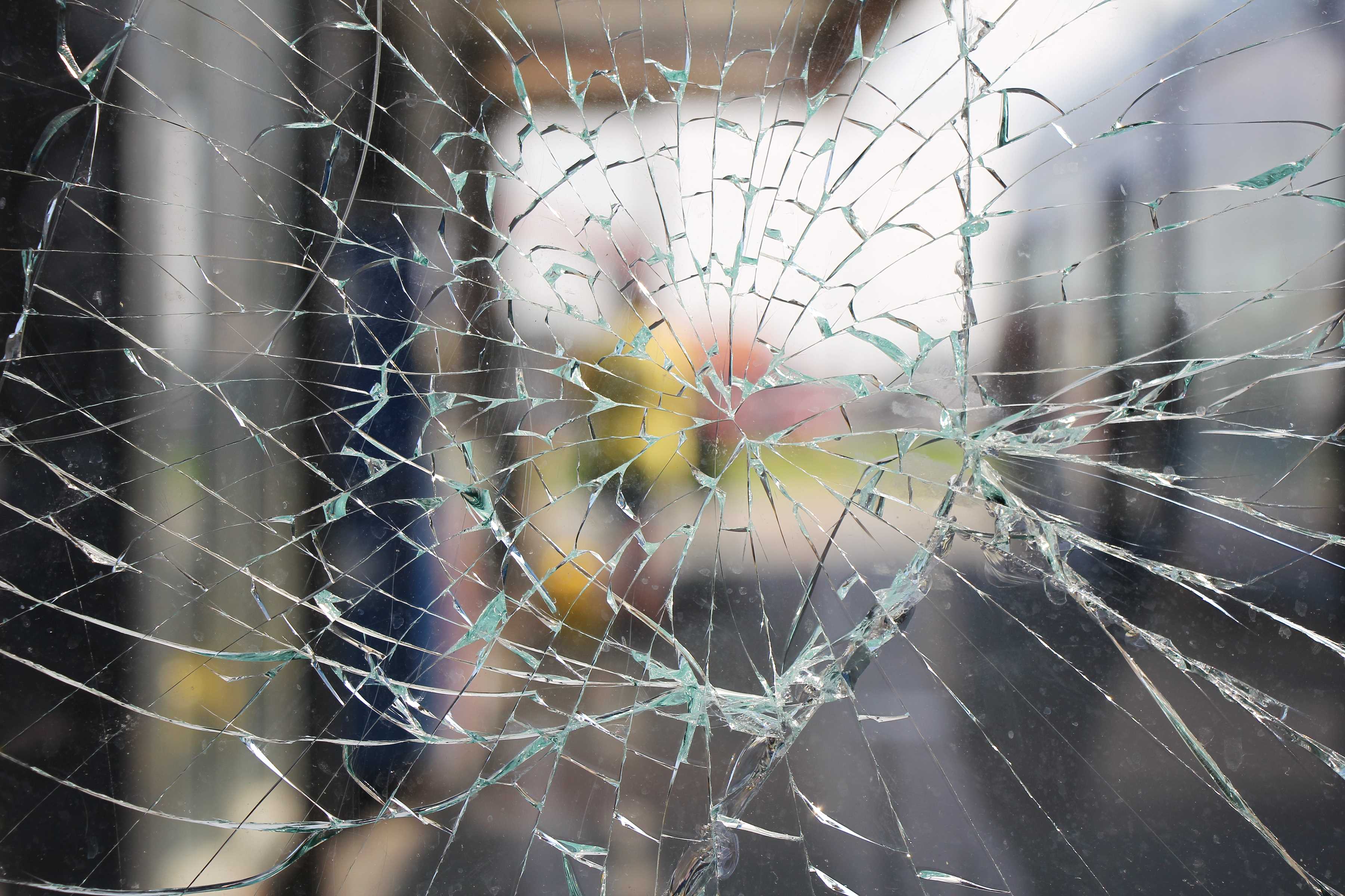 close up of the broken glass of a window
